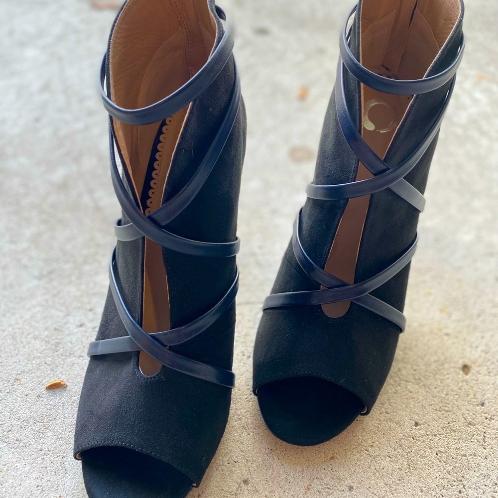 Black strappy heeled boots